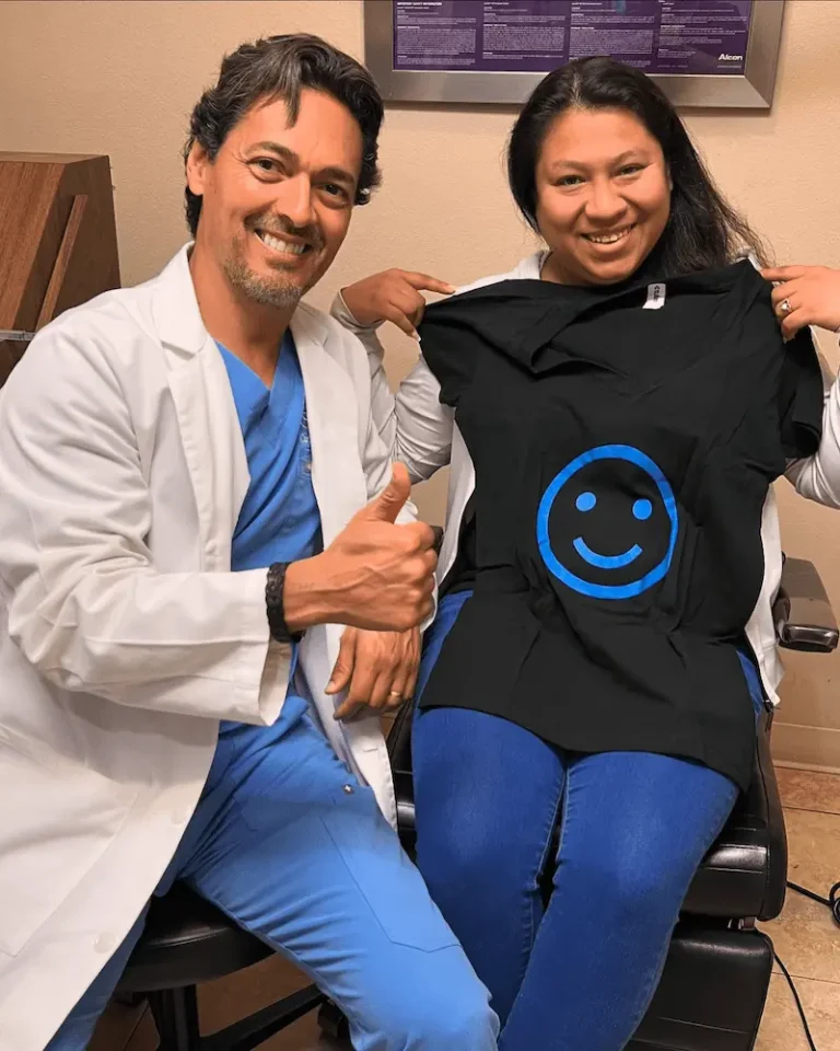 Dr. Montoya with a patient giving their testimonial