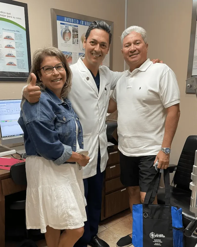 Dr. Carlos Montoya with happy patients